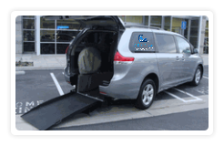 grey car with a ramp